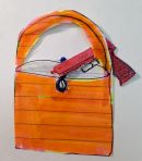 pink handgun in orange handbag